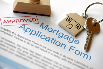 Mortgage application form with fields for personal and financial information, ready for completion.